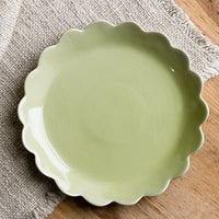 Meadow Green: A scalloped ceramic dessert plate in green.