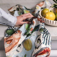 Seafood & Citrus: A printed linen tea towel with fish and citrus print.