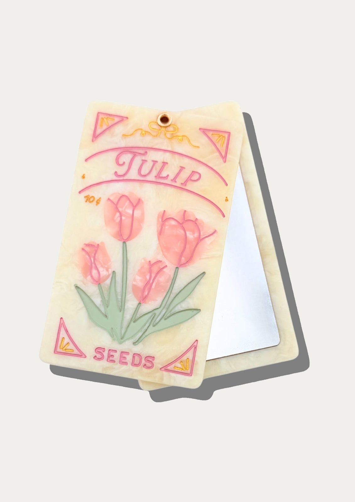 Seeds packet with tulip design compact mirror.
