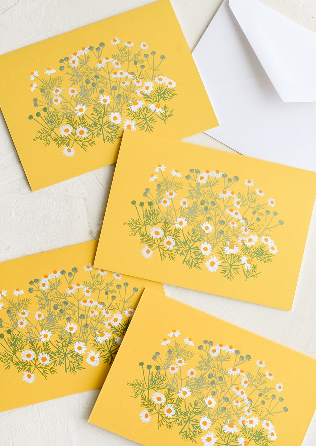 Chamomile: A set of yellow cards with chamomile floral print.