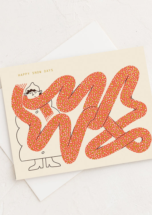 A card with illustration of girl wearing very long scarf, text reads "Happy snow days".