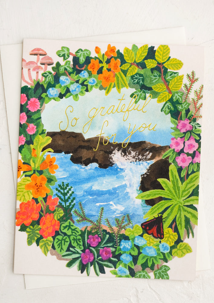 A card with tropical ocean and flower illustration, text reads "So grateful for you".