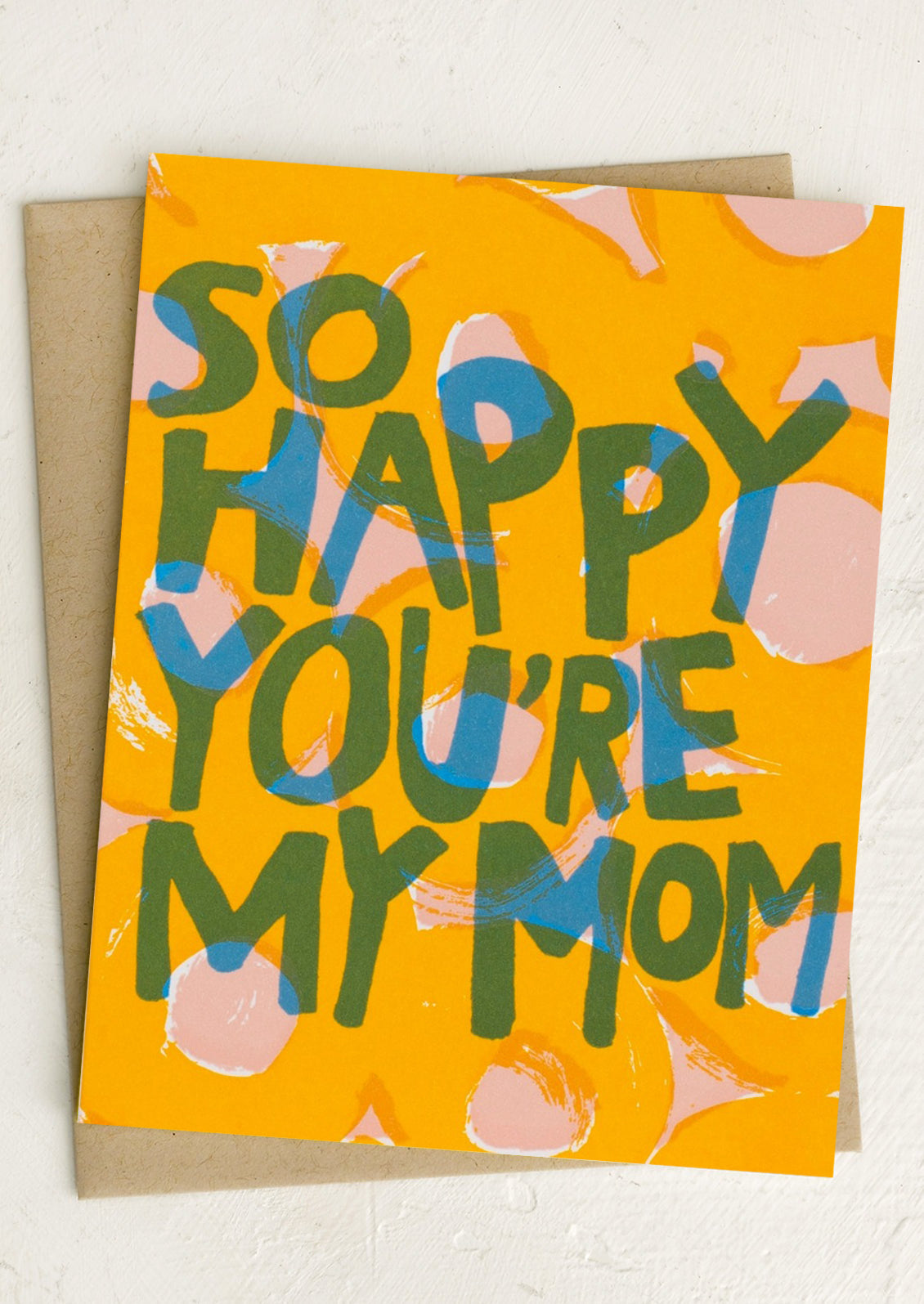 A greeting card reading "So happy you're my mom".