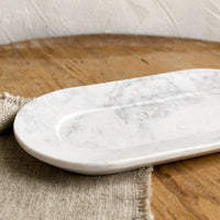 2: An oval shaped marble catchall tray.
