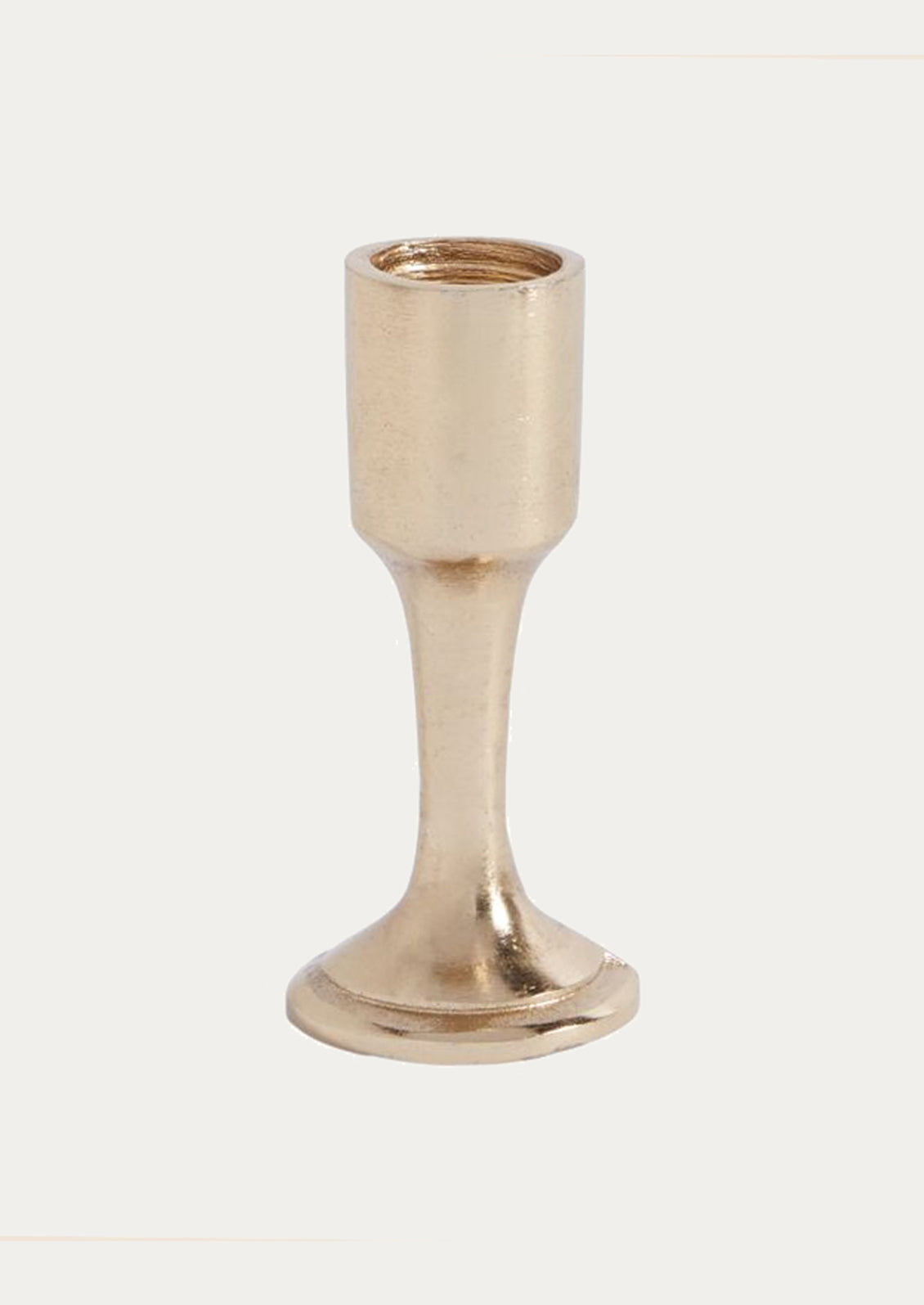 Gold candle holder on a white background