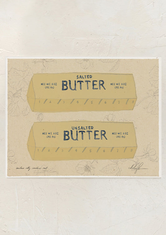 An art print of an illustration of two sticks of butter on a floral background.