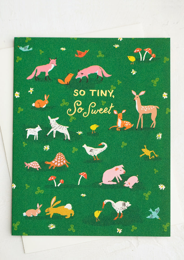 A card with baby animal illustrations, text reads "So tiny, so sweet".