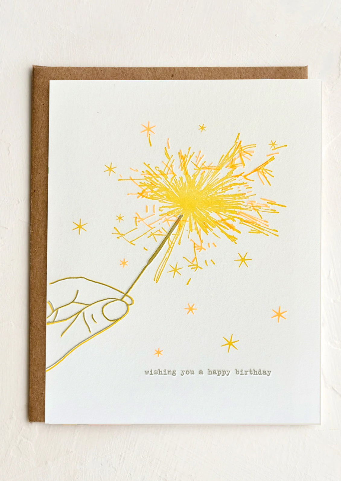 Greeting card with yellow sparkler illustration and text on a white background