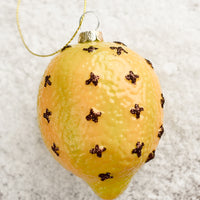 Lemon: A glass ornament of a clove spiked lemon.