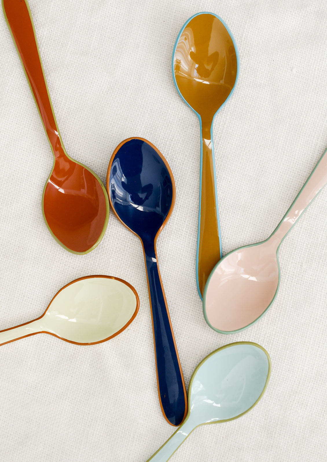 Enamel spoons in assorted colors.