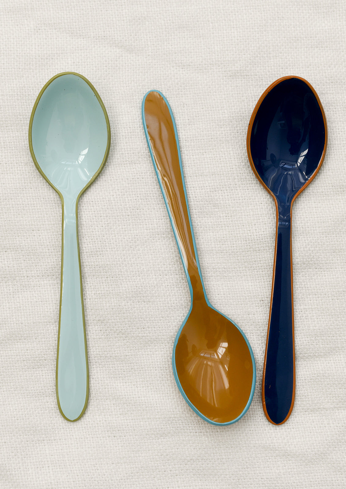 Enamel spoons in cool colors.