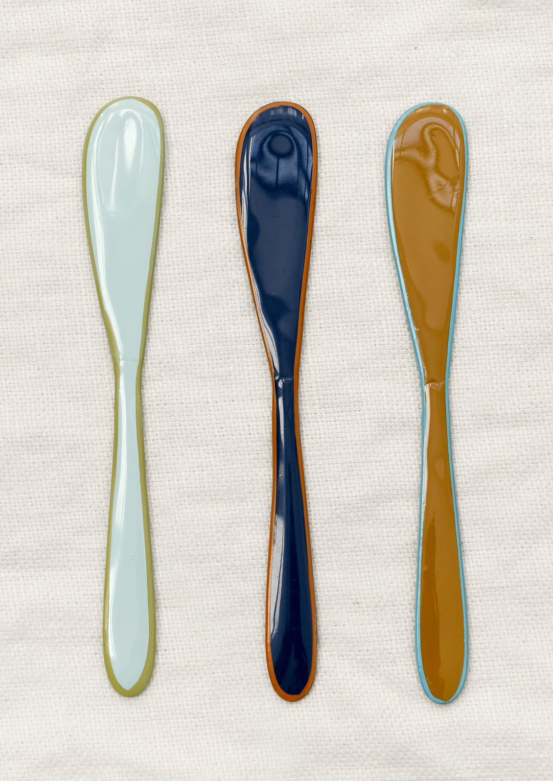 Enamel knifes in cool colors.