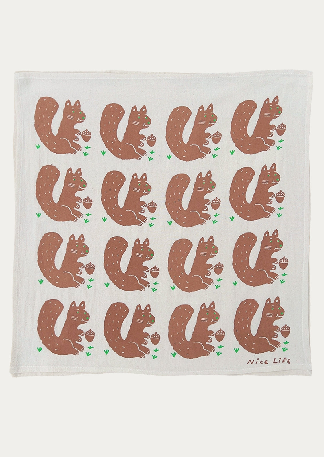 A tea towel with repeating squirrel motif.