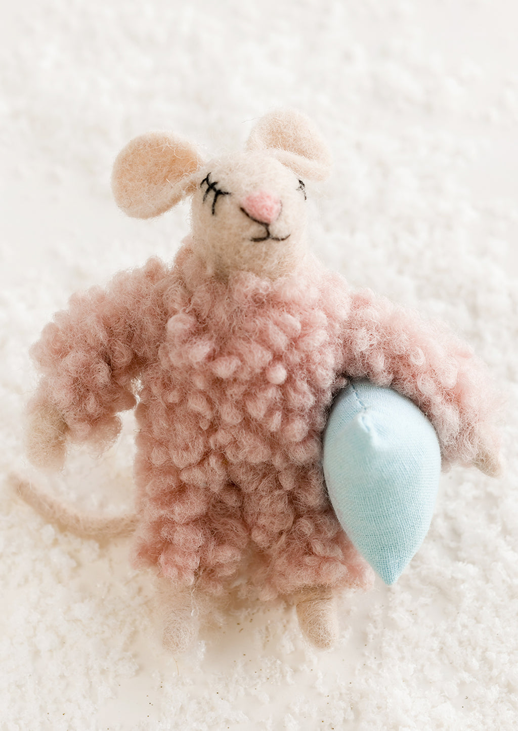 Pillow: A felted mouse ornament in pink fuzzy pajamas, holding a blue pillow.