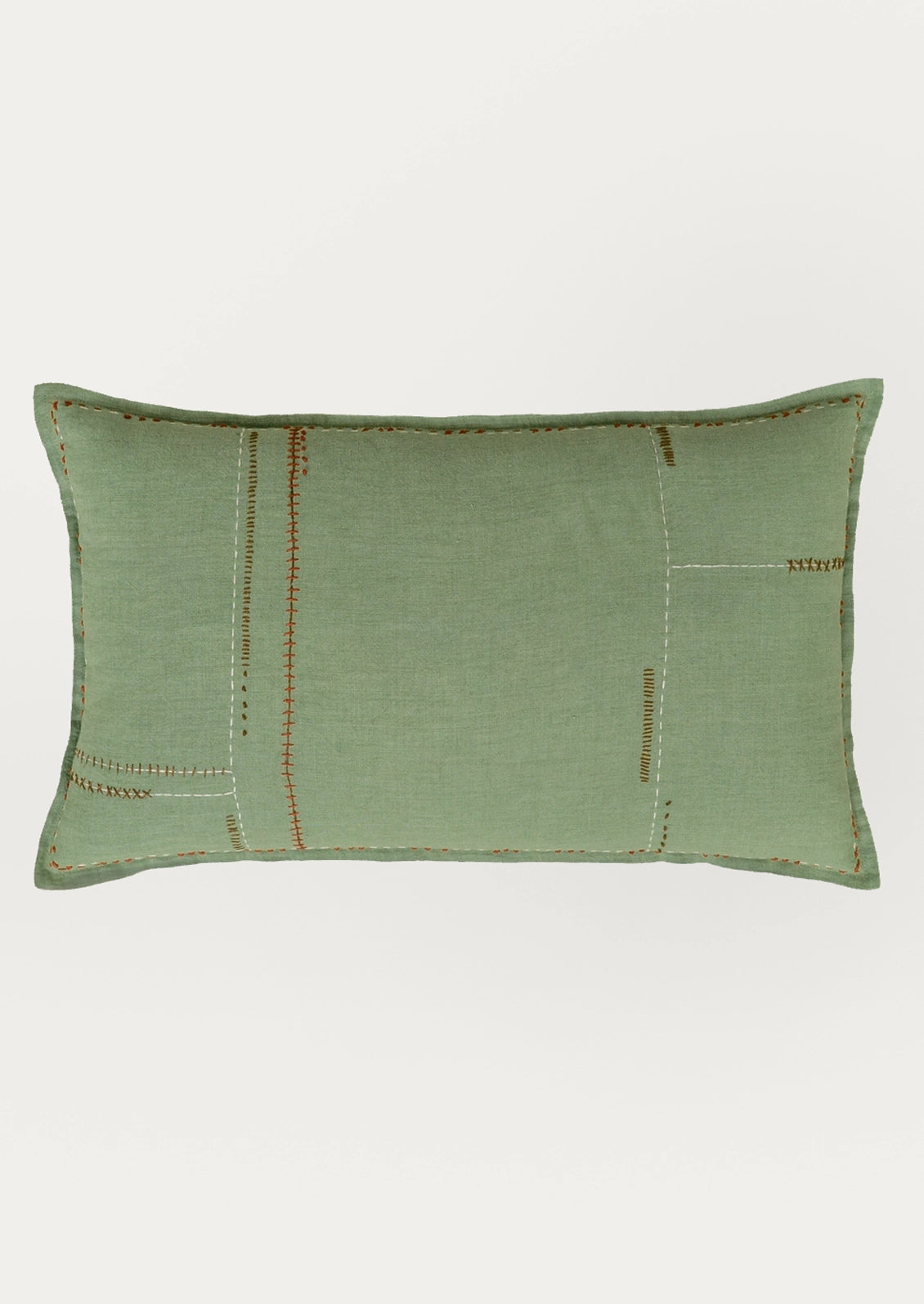 A rectangular sage green lumbar pillow with a linen-like textured fabric and decorative patchwork-style stitching in contrasting orange-brown and cream thread, shown against a plain light gray background.