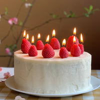 Strawberries / Set of 5: Birthday candles in the shape of strawberries.