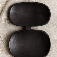 Large: A double wide wooden dish with mirrored oval shape in blackened wood.