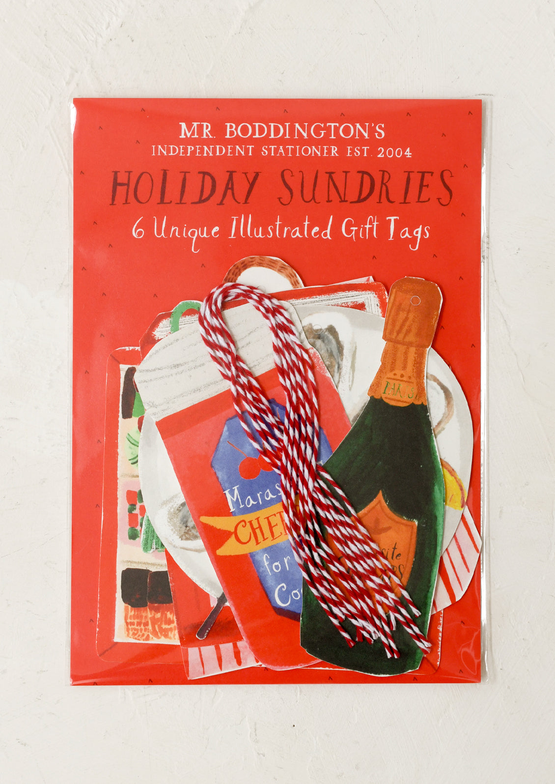 A set of gift tags in assorted festive shapes.