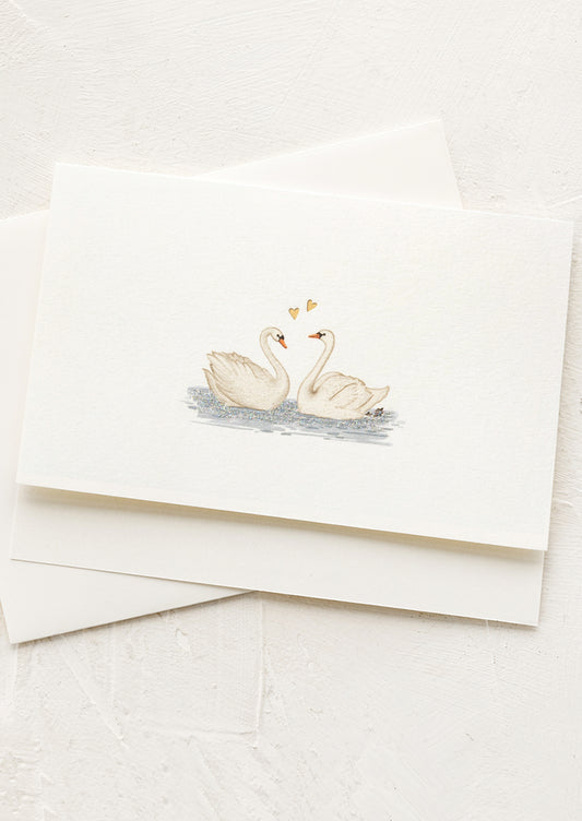 Card swan design on a white background