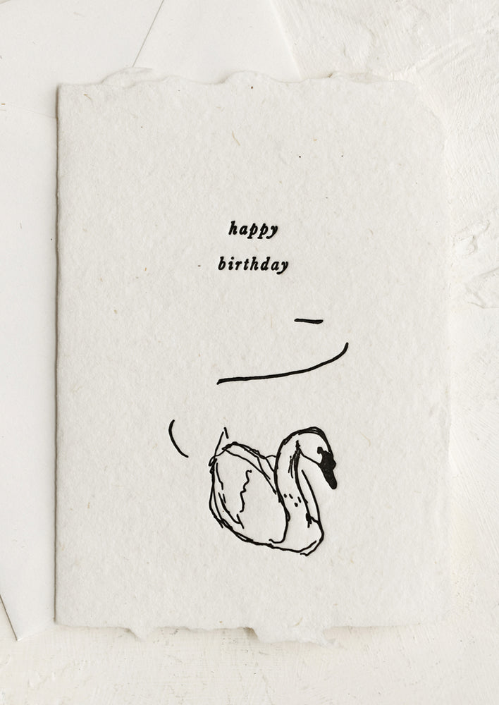A natural handmade paper card with swan "Happy Birthday".