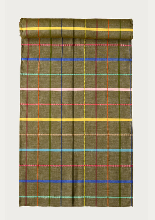 A table runner with multicolor plaid print on khaki background.