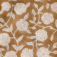 2: A block printed tablecloth in brown and white floral motif.