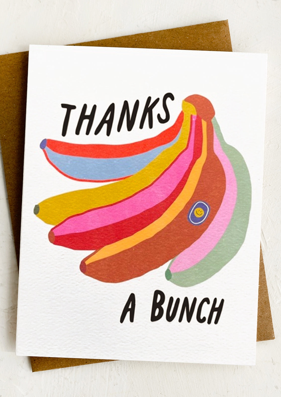 Greeting card with colorful bananas and 'Thanks a Bunch' text on a white background
