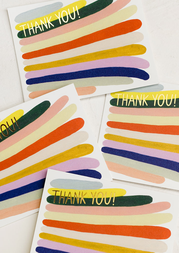 A colorful set of thank you cards with stripe pattern.