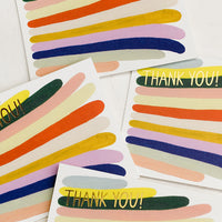 Boxed Set of 8: A colorful set of thank you cards with stripe pattern.
