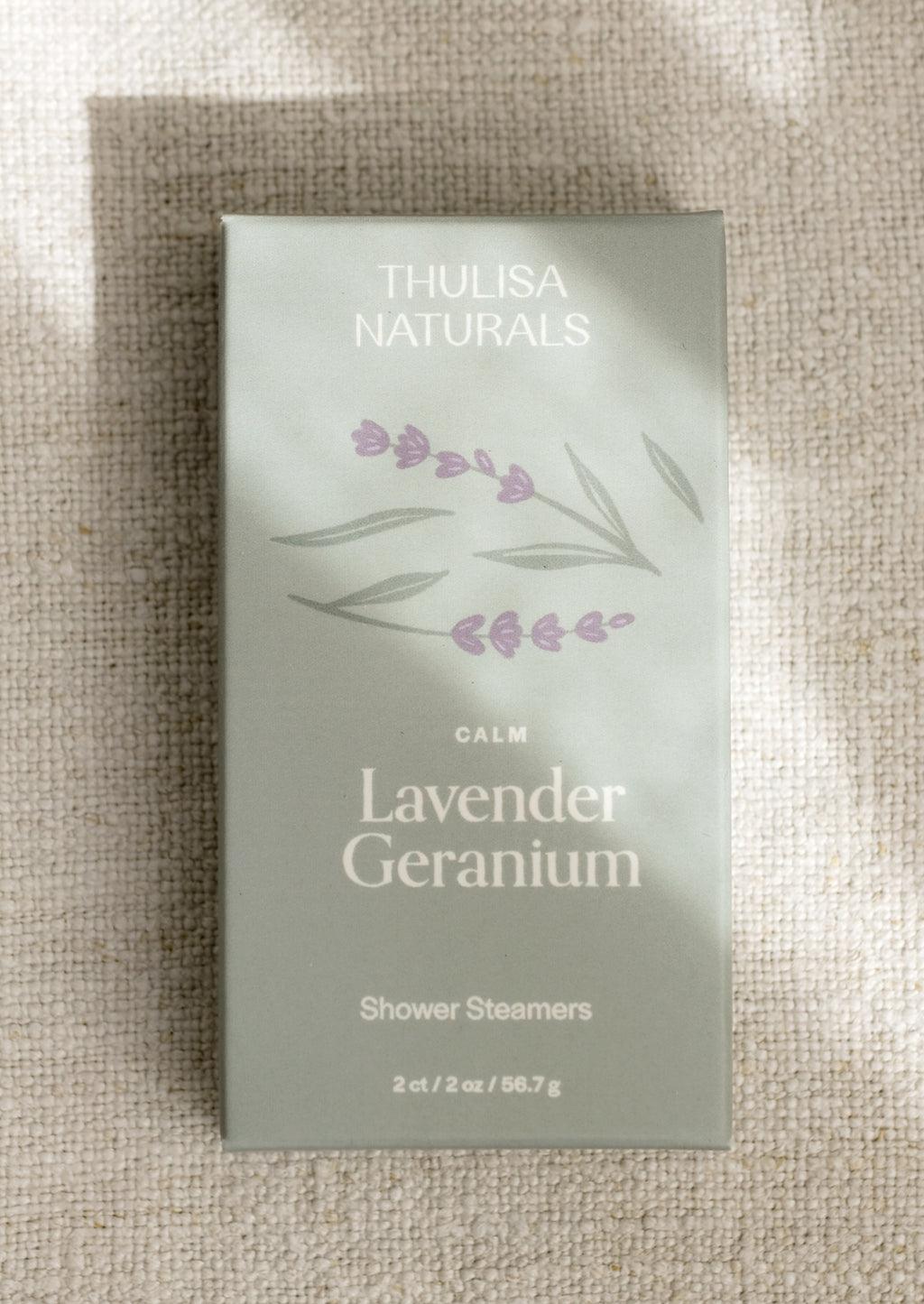 Lavender Geranium: A 2 pack of shower steamers in lavender geranium "calm" scent.