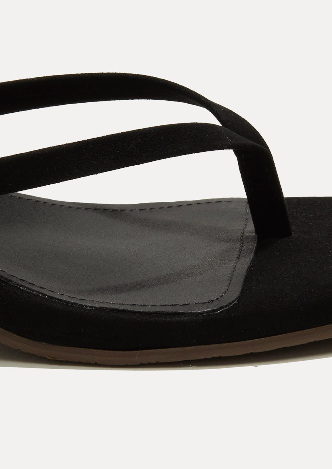 A black suede kitten heel sandal with a square toe by TKEES.