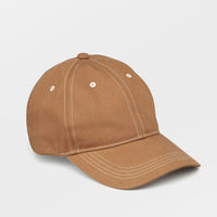 Toffee: A brown color baseball cap with contrast white stitching.