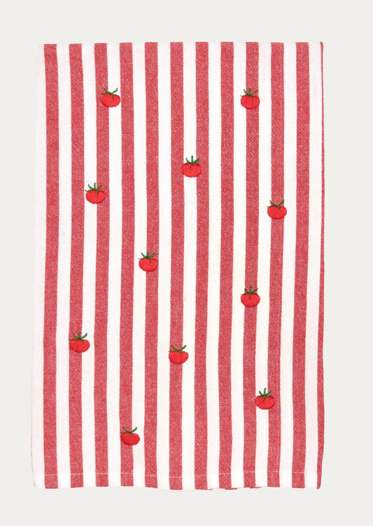Red and white striped towel with small red tomato patterns on a white background