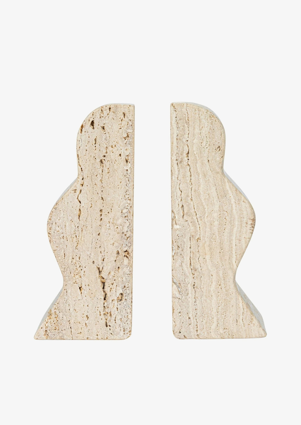 2: A pair of natural travertine bookends with wavy squiggle shape.