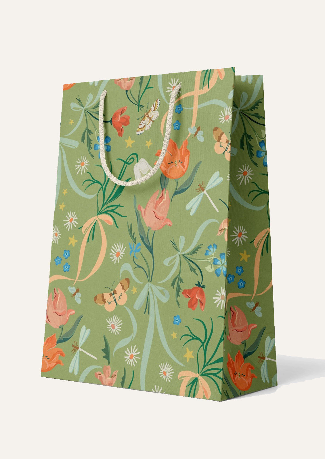 Green gift bag with floral and butterfly pattern.