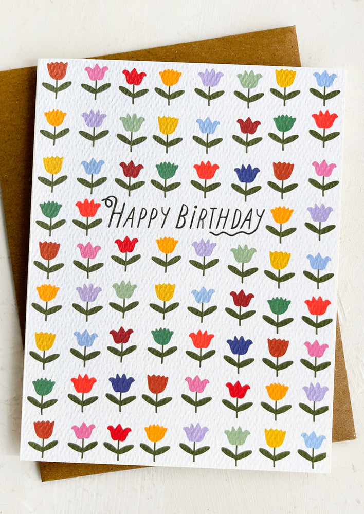 A tulip print card reading "Happy birthday".