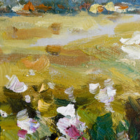 2: A framed original oil painting of a colorful meadow in the countryside.