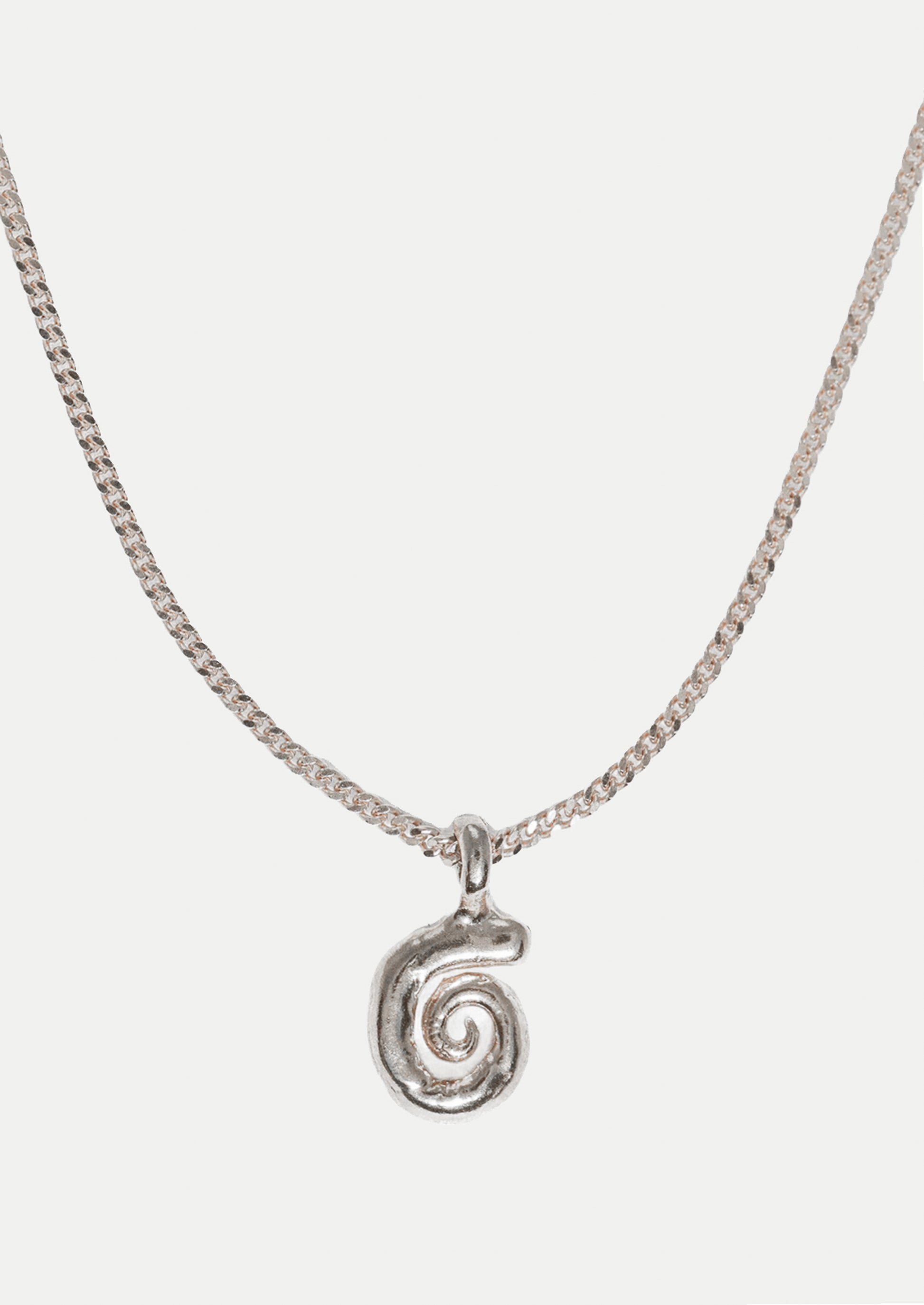 Silver necklace with a spiral pendant on a white background