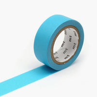 Turquoise: A roll of washi tape in solid turquoise color.