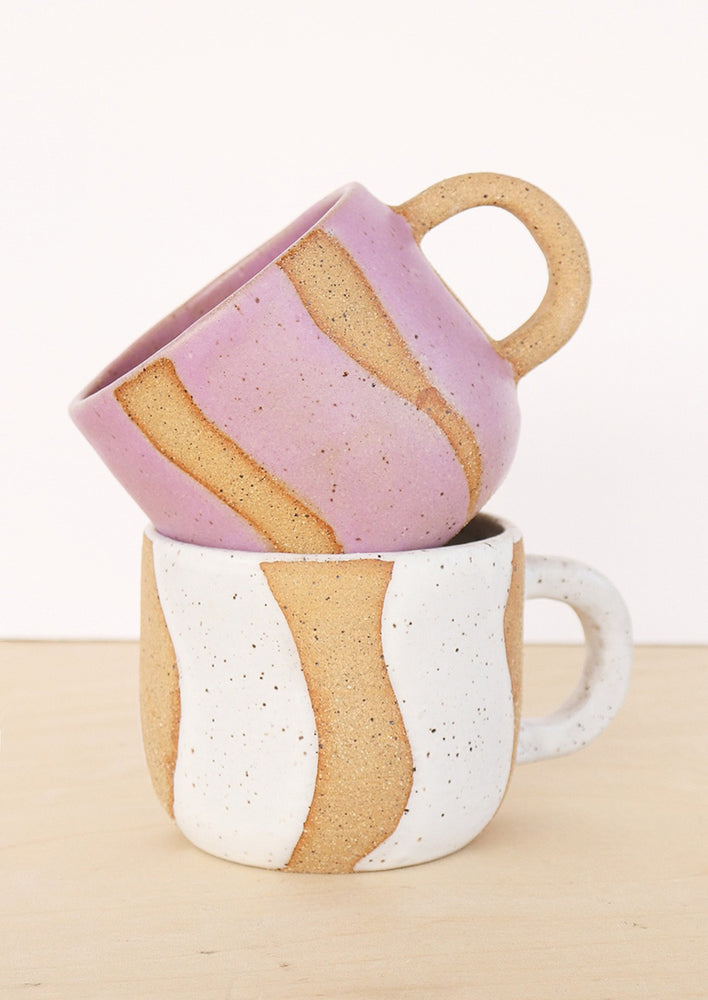 Wavy stripe ceramic mugs.