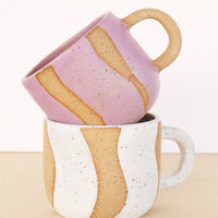 1: Wavy stripe ceramic mugs.