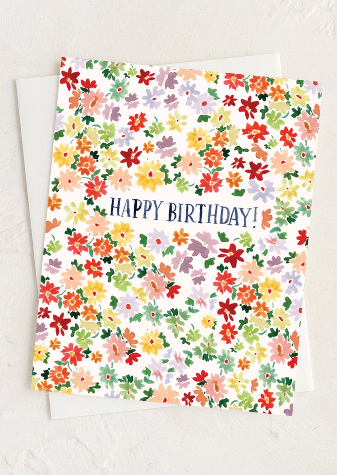 A floral print birthday card.