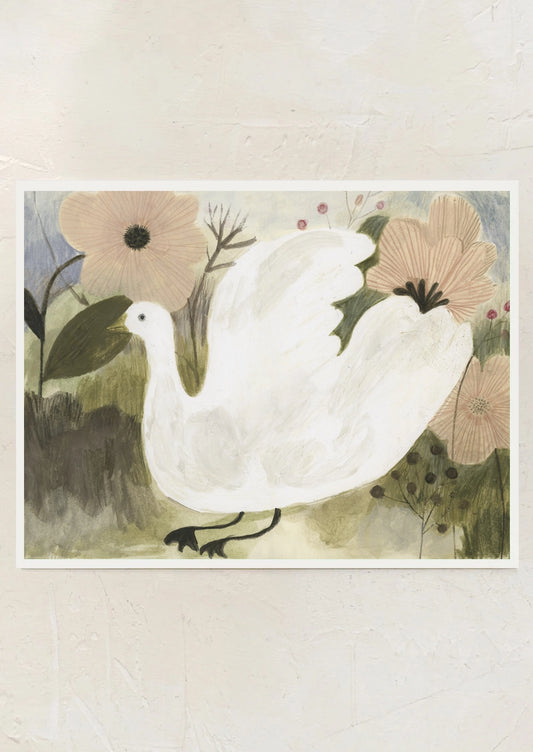 An art print featuring a depiction of a white goose among a floral backdrop.
