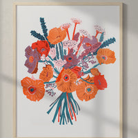 2: A risograph print with orange and red bouquet in wood frame.