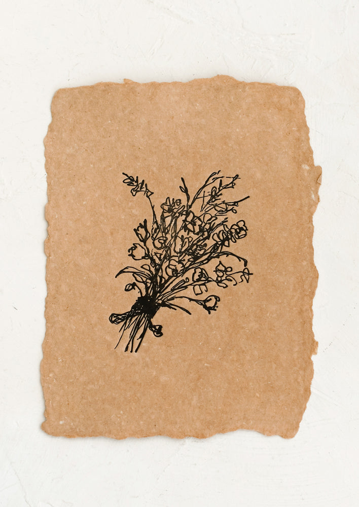 An art print in rust-colored hand dyed paper with letterpressed image of floral bouquet.