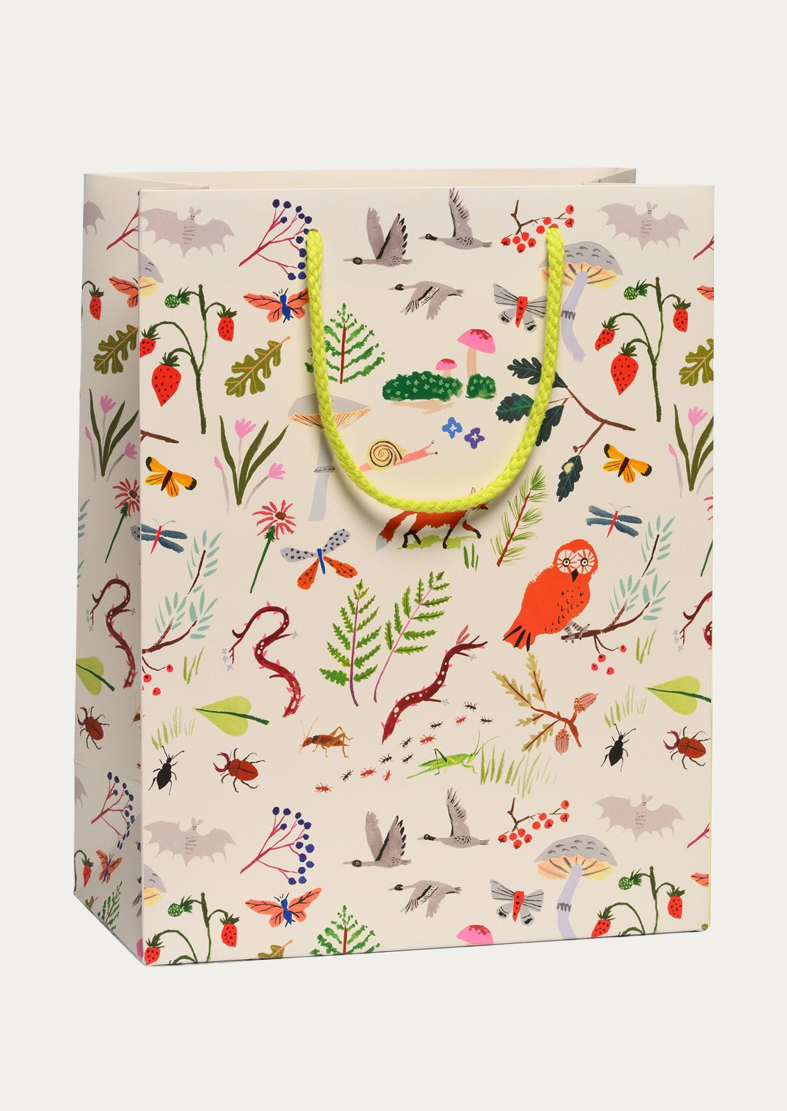Gift bag with nature-themed design featuring animals and plants on a white background