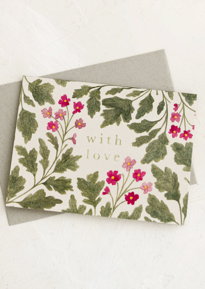 A floral print greeting card with text reading "With love".