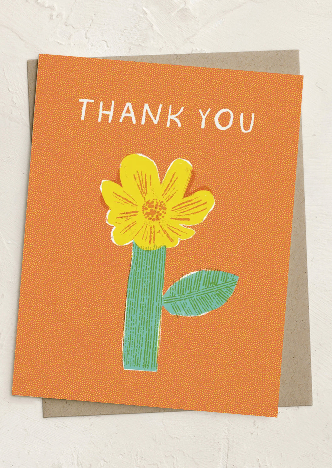 Orange card with a yellow flower illustration and 'Thank You' text on a beige background