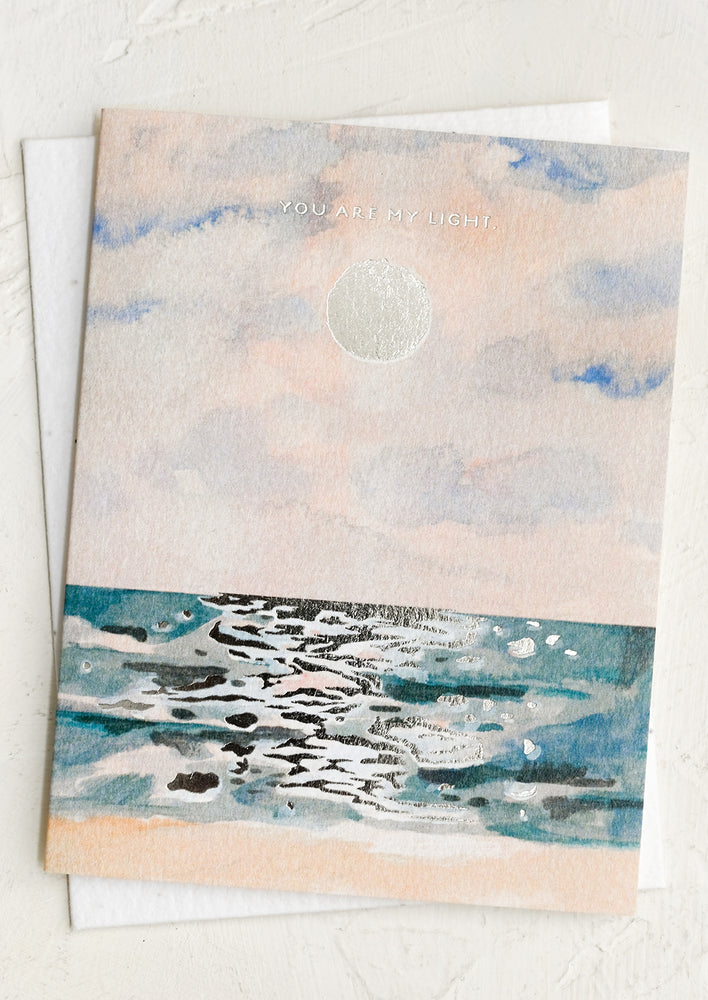 An ocean print card reading "You are my light".