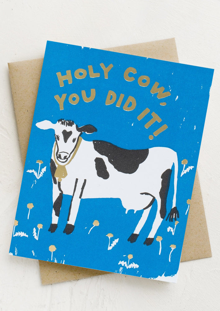 A blue card with cow reading "Holy cow, you did it".